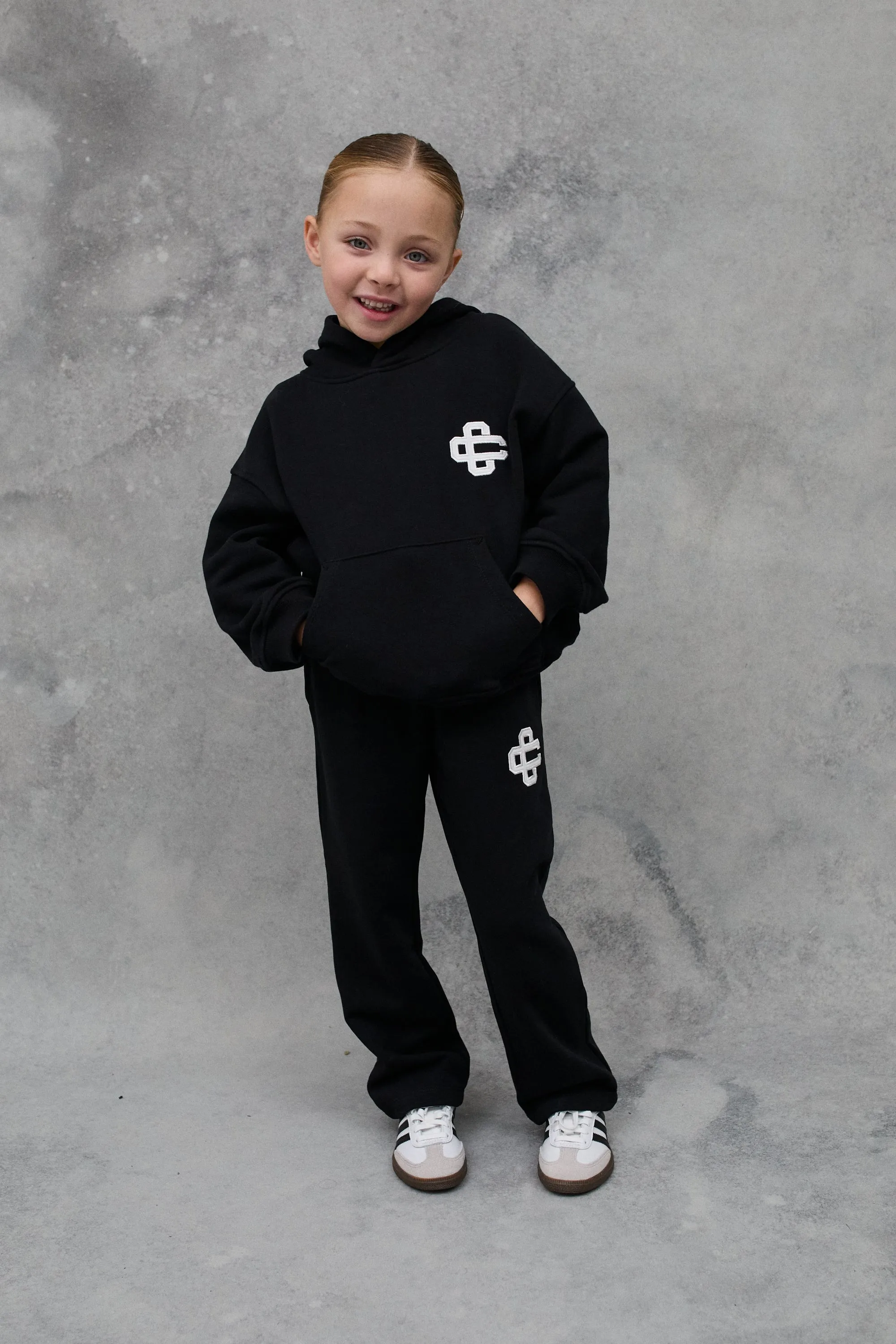 KIDS EMBLEM APPLIQUE JOGGERS - BLACK